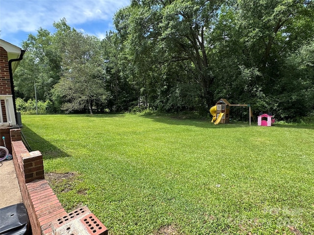 232 Harmony Hills Dr, Catawba, SC 29704 - view of green lawn with a playground