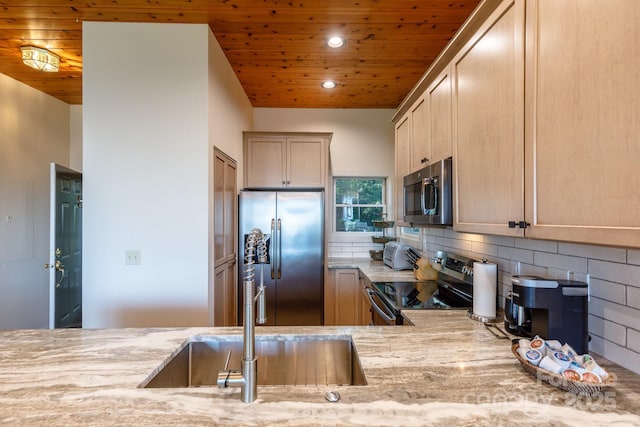 114 Slickrock Rd Unit C/3, Burnsville, NC 28714 - kitchen with stainless steel appliances, a sink, wood ceiling, light stone countertops, and decorative backsplash