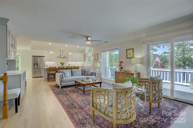 18205 Royal Oak Rd, Charlotte, NC 28278 - living area featuring ornamental molding, ceiling fan, and light wood-type flooring
