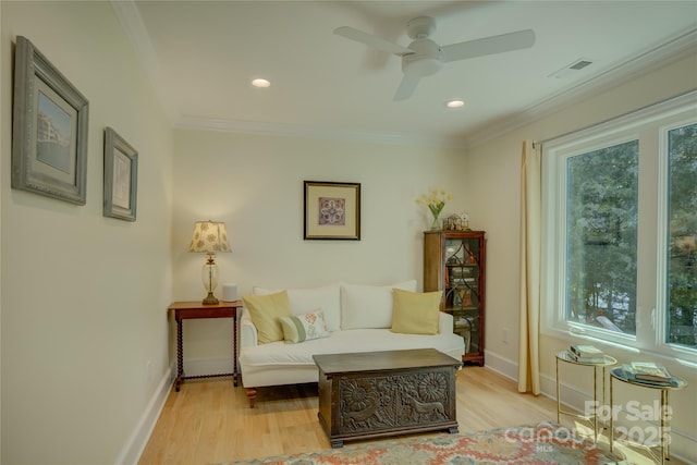 18205 Royal Oak Rd, Charlotte, NC 28278 - sitting room with light wood-style flooring, ceiling fan, recessed lighting, and crown molding
