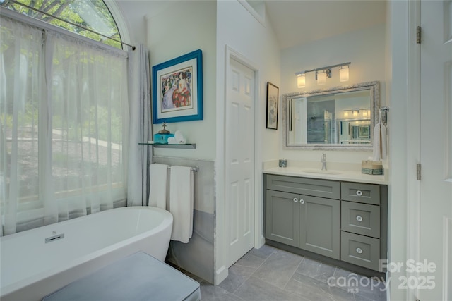 18205 Royal Oak Rd, Charlotte, NC 28278 - bathroom with a soaking tub, vanity, and marble finish floors