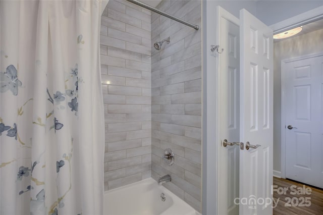 18205 Royal Oak Rd, Charlotte, NC 28278 - bathroom featuring shower / bath combination with curtain and wood finished floors