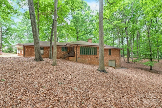 3985 Well Rd, Mint Hill, NC 28227 - ranch-style home featuring a chimney and brick siding