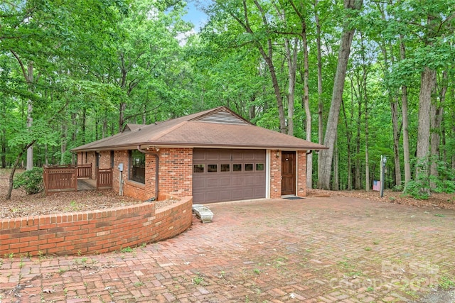 3985 Well Rd, Mint Hill, NC 28227 - view of front of property featuring an attached garage, brick siding, decorative driveway, and roof with shingles
