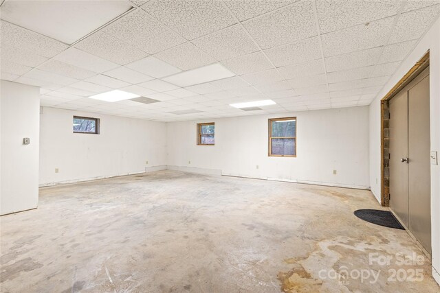 3985 Well Rd, Mint Hill, NC 28227 - unfurnished room with unfinished concrete flooring and a paneled ceiling