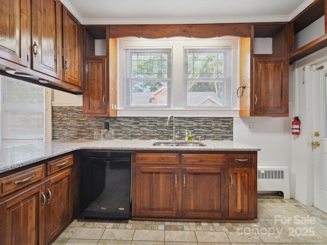 729 Montgomery Ave, Albemarle, NC 28001 - kitchen featuring dishwasher, radiator heating unit, a sink, decorative backsplash, and light stone counters