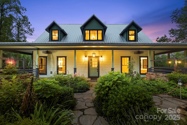 231 Bible School Rd, Lake Lure, NC 28746 - view of front facade featuring covered porch and metal roof