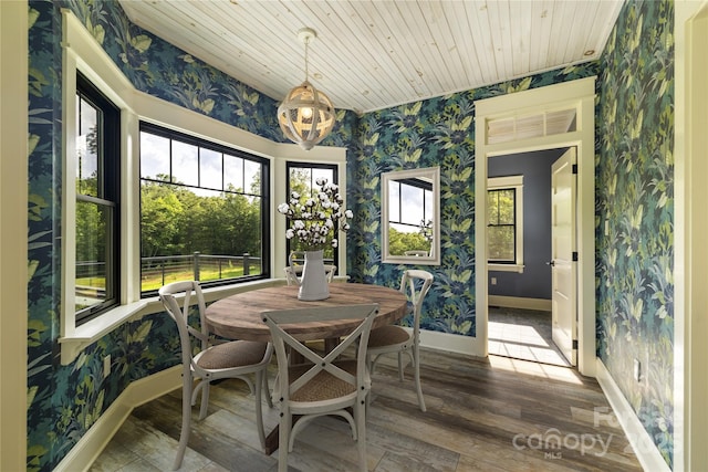 231 Bible School Rd, Lake Lure, NC 28746 - dining area with wallpapered walls, healthy amount of natural light, wood finished floors, baseboards, and wooden ceiling