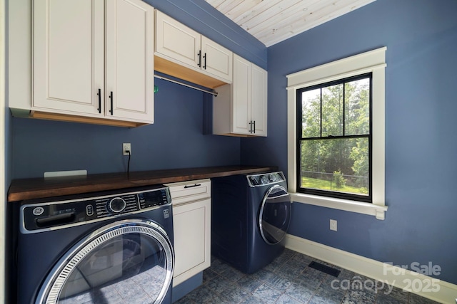 231 Bible School Rd, Lake Lure, NC 28746 - laundry area with cabinet space, separate washer and dryer, baseboards, and wooden ceiling