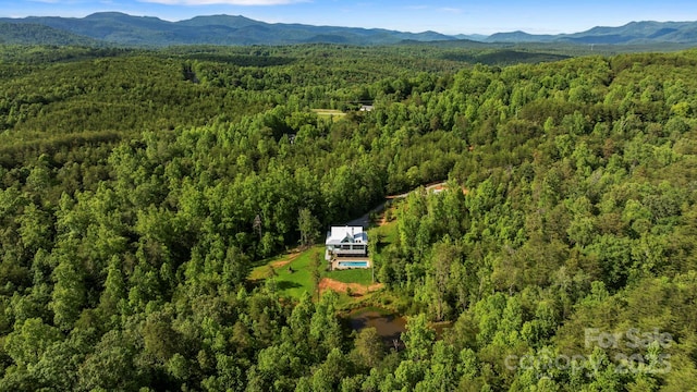 231 Bible School Rd, Lake Lure, NC 28746 - aerial view of property and surrounding area featuring a forest and mountains