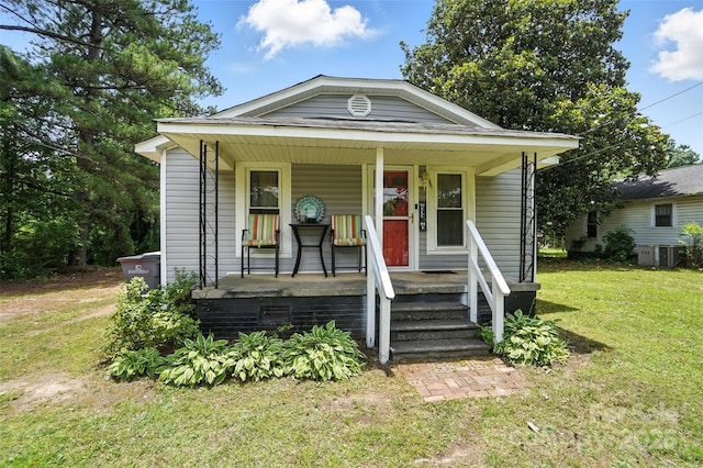 407 Rosemont Ave, Kannapolis, NC 28081 - view of front of home with a porch and a front lawn