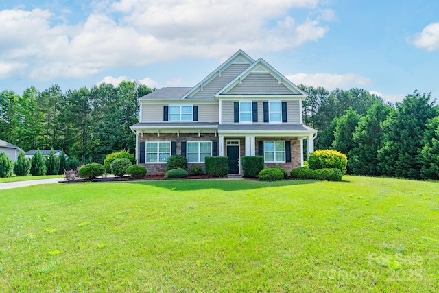 11922 Kimberfield Rd, Matthews, NC 28105 - view of front facade featuring a front yard and stone siding