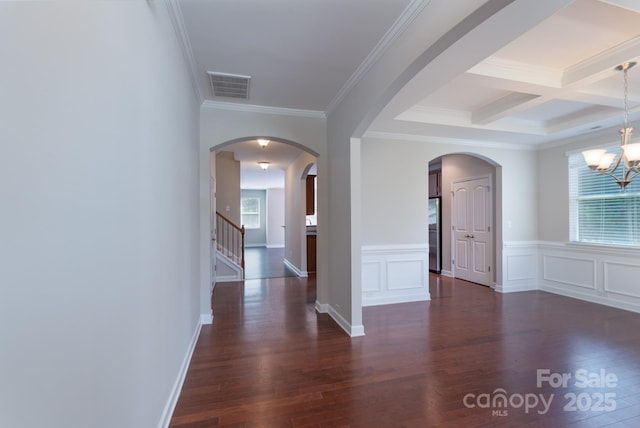 11922 Kimberfield Rd, Matthews, NC 28105 - corridor featuring plenty of natural light, crown molding, dark wood-style flooring, a chandelier, and beam ceiling