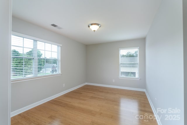 11922 Kimberfield Rd, Matthews, NC 28105 - spare room with light wood-style floors and baseboards