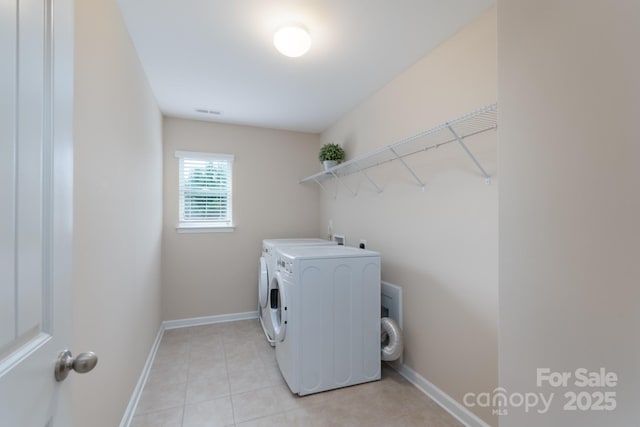 11922 Kimberfield Rd, Matthews, NC 28105 - laundry room with separate washer and dryer and light tile patterned floors