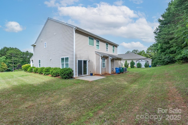 11922 Kimberfield Rd, Matthews, NC 28105 - rear view of house featuring a lawn, a patio area, and an outdoor structure