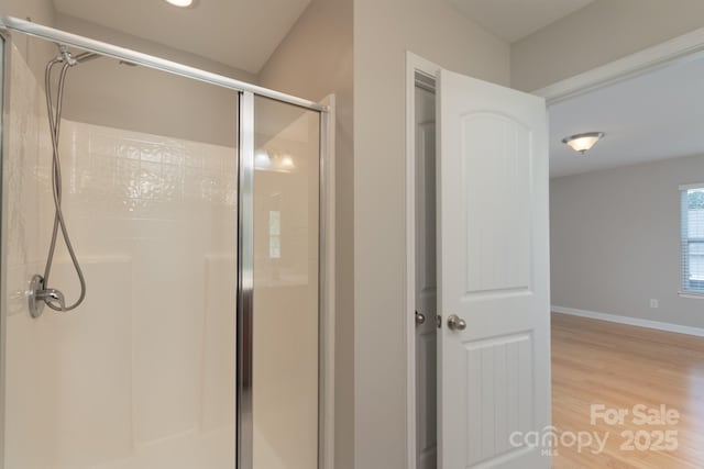 11922 Kimberfield Rd, Matthews, NC 28105 - full bathroom featuring a shower stall and wood finished floors