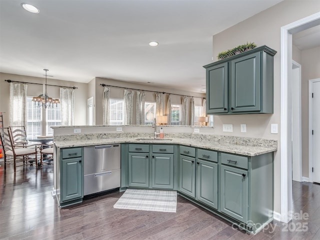 7700 Antique Cir, Waxhaw, NC 28173 - kitchen with dishwasher, a chandelier, dark wood finished floors, a peninsula, and light stone counters