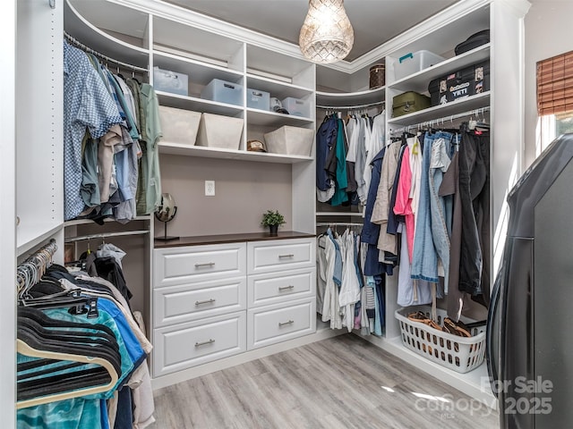 7700 Antique Cir, Waxhaw, NC 28173 - walk in closet featuring wood finished floors