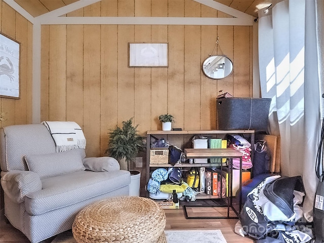 7700 Antique Cir, Waxhaw, NC 28173 - living area with vaulted ceiling, wood finished floors, and wood walls