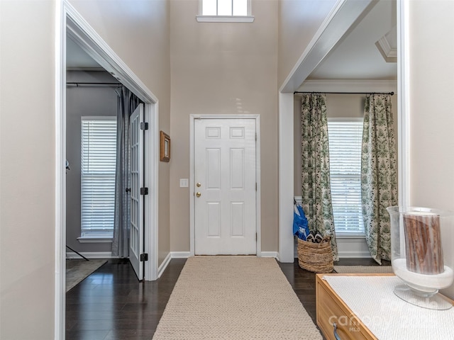 7700 Antique Cir, Waxhaw, NC 28173 - foyer featuring dark wood-style flooring, plenty of natural light, and a towering ceiling