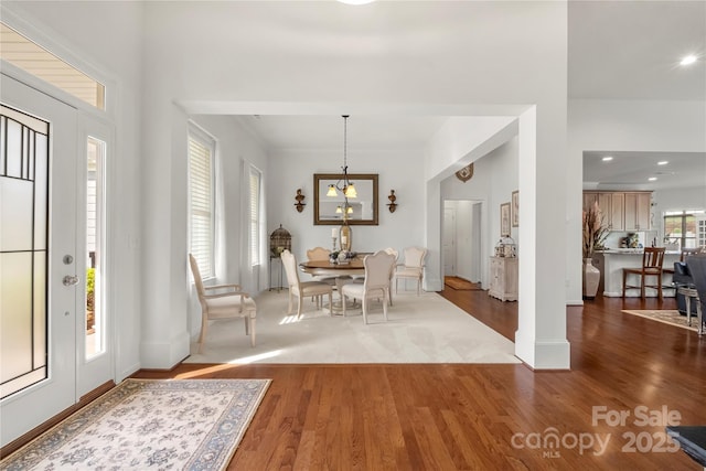 2399 Ashbourne Pl SE, Concord, NC 28025 - foyer featuring wood finished floors, a chandelier, and recessed lighting