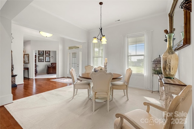 2399 Ashbourne Pl SE, Concord, NC 28025 - dining space featuring ornamental molding and wood finished floors