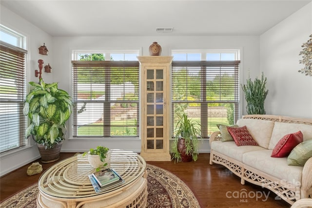 2399 Ashbourne Pl SE, Concord, NC 28025 - living room featuring wood finished floors and baseboards