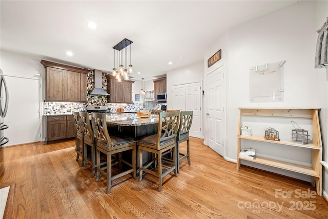 162 Castles Gate Dr, Mooresville, NC 28117 - dining room featuring light wood-style floors and recessed lighting