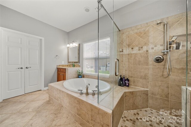 162 Castles Gate Dr, Mooresville, NC 28117 - full bathroom featuring a stall shower, vanity, and a garden tub