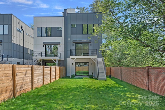209 Keswick Ave, Charlotte, NC 28206 - back of house with stairway, a fenced backyard, and a chimney