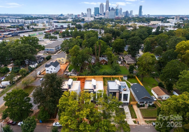 209 Keswick Ave, Charlotte, NC 28206 - aerial view of property and surrounding area featuring skyline and property parcel outlined