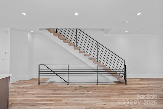 209 Keswick Ave, Charlotte, NC 28206 - stairs with wood finished floors and recessed lighting