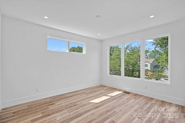 209 Keswick Ave, Charlotte, NC 28206 - spare room with plenty of natural light, light wood-style floors, and recessed lighting