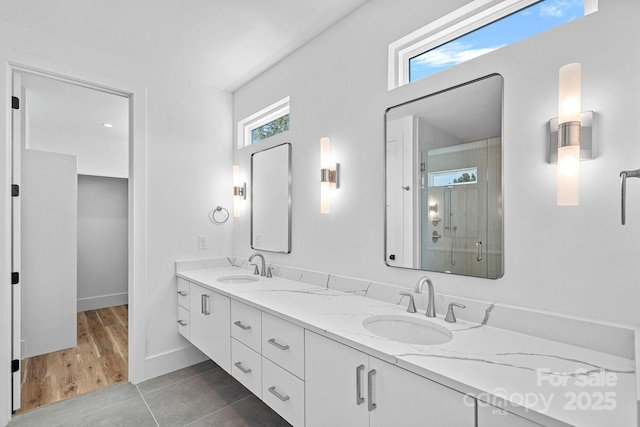 209 Keswick Ave, Charlotte, NC 28206 - full bath with double vanity, a stall shower, and tile patterned flooring