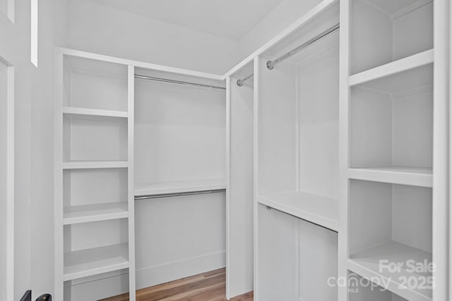 209 Keswick Ave, Charlotte, NC 28206 - walk in closet featuring wood finished floors