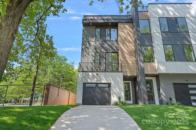209 Keswick Ave, Charlotte, NC 28206 - contemporary home with an attached garage, driveway, and stucco siding