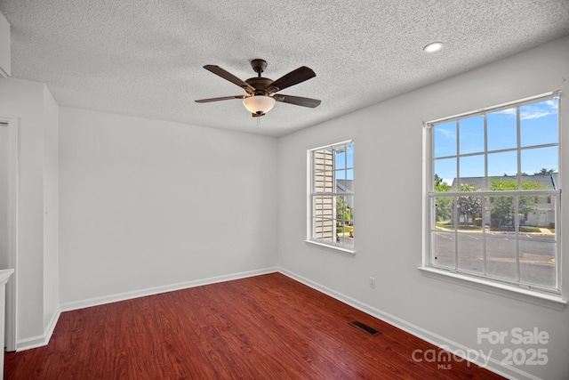 218 Water Oak Dr, Pineville, NC 28134 - spare room with wood finished floors, ceiling fan, a textured ceiling, and recessed lighting
