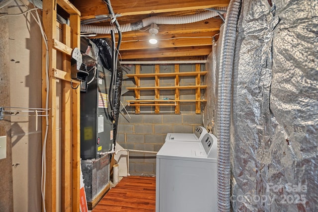 218 Water Oak Dr, Pineville, NC 28134 - basement with washer and clothes dryer, concrete block wall, and wood finished floors