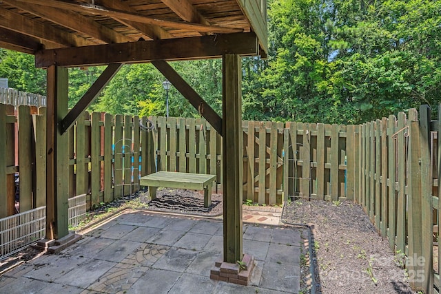 218 Water Oak Dr, Pineville, NC 28134 - fenced backyard with a patio