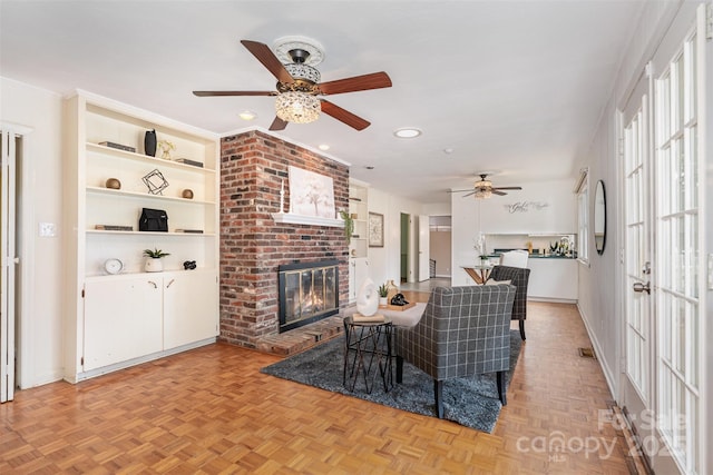 1925 Montclair Ave, Gastonia, NC 28054 - living room with ceiling fan, a fireplace, recessed lighting, and built in shelves