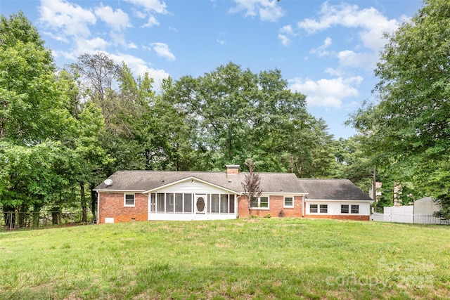 1925 Montclair Ave, Gastonia, NC 28054 - back of property featuring a sunroom, brick siding, and a chimney