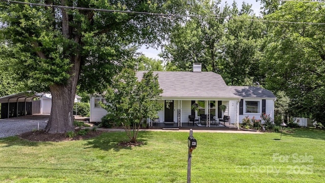 120 Hilltop St, Connelly Springs, NC 28612 - view of front of house with covered porch, a carport, driveway, and a front lawn