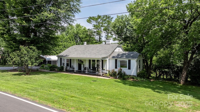 120 Hilltop St, Connelly Springs, NC 28612 - view of front of property featuring a porch, a front lawn, a chimney, and roof with shingles