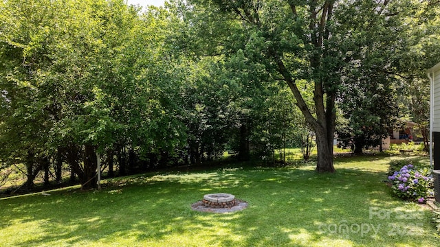 120 Hilltop St, Connelly Springs, NC 28612 - view of grassy yard featuring a fire pit