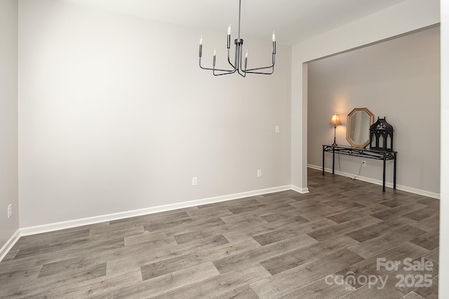 171 Old Harbor Dr, Mount Gilead, NC 27306 - unfurnished dining area with a chandelier and wood finished floors