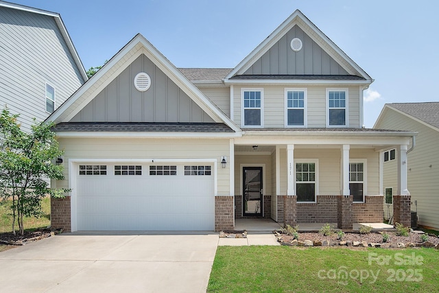 171 Old Harbor Dr, Mount Gilead, NC 27306 - craftsman inspired home with board and batten siding, brick siding, driveway, and a porch