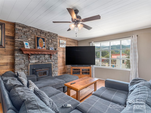 157 Evergreen Cir, Waynesville, NC 28786 - living room featuring wooden walls, ceiling fan, wood finished floors, and wood ceiling