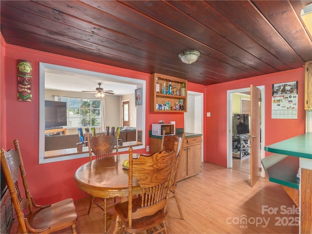 157 Evergreen Cir, Waynesville, NC 28786 - dining room with wood ceiling and light wood finished floors