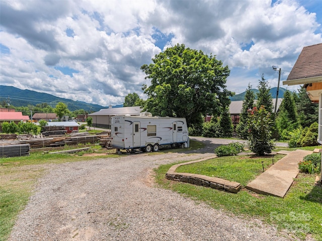 157 Evergreen Cir, Waynesville, NC 28786 - view of dirt / gravel driveway with a mountain view